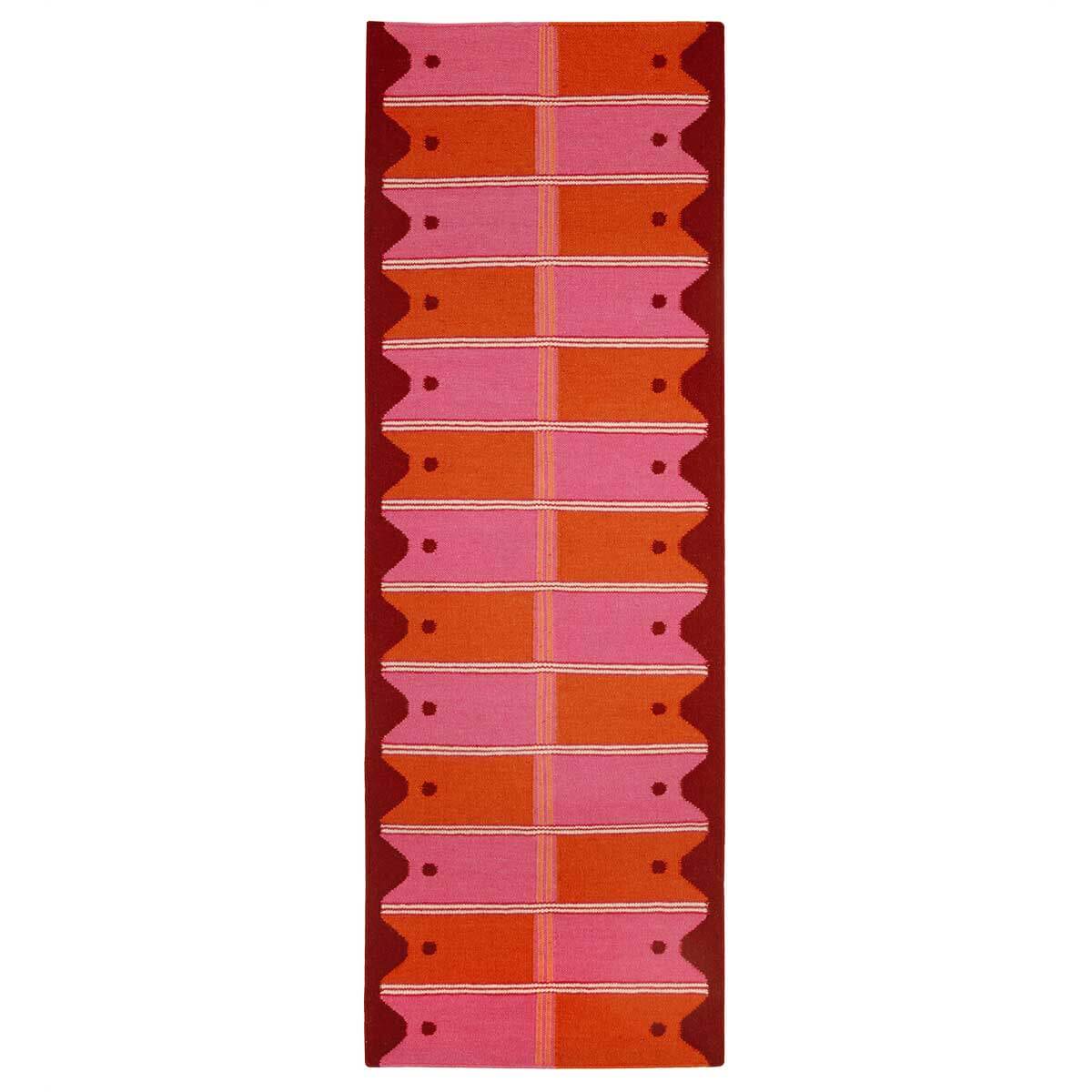 Pink and Orange Flatweave Runner Rug with checkered pattern and wavy border.