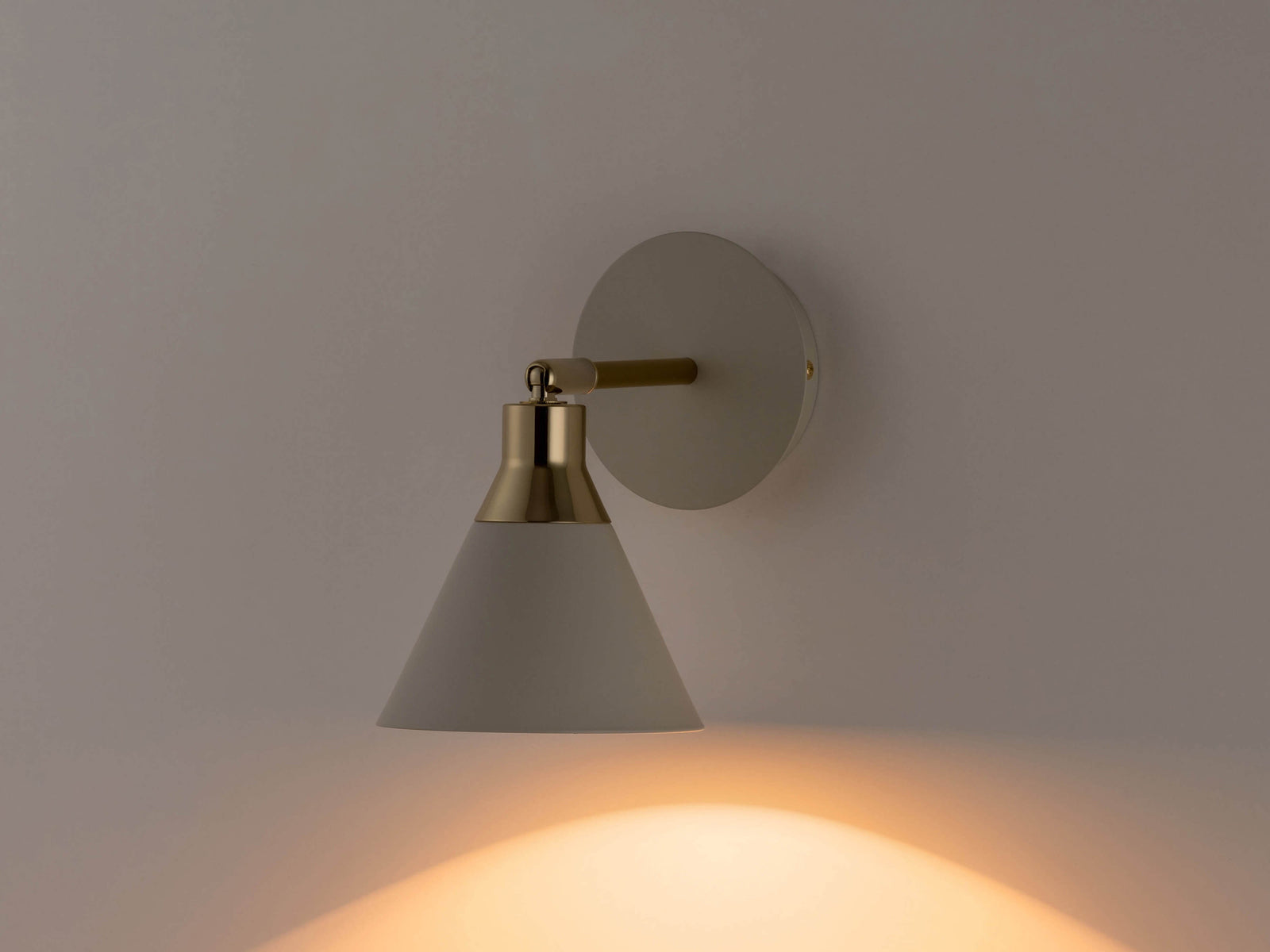 Sand cone wall light