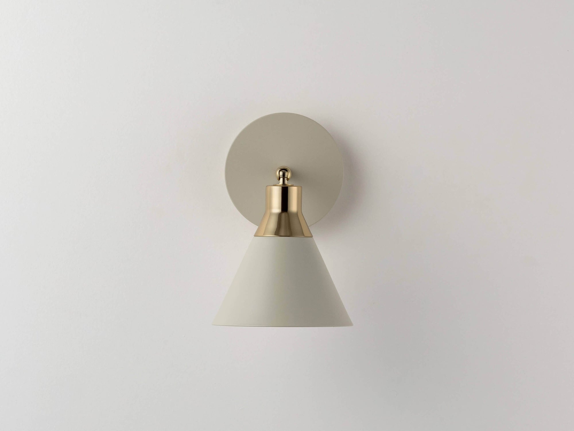 Sand cone wall light