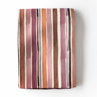Lisbon Stripe linen tablecloth styled on round dining table - Goldie Home