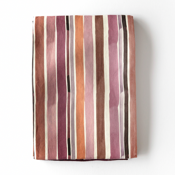 Lisbon Stripe linen tablecloth styled on round dining table - Goldie Home