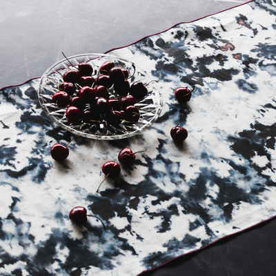 Grey Marble linen table runner styled on dining table with candles - Goldie Home