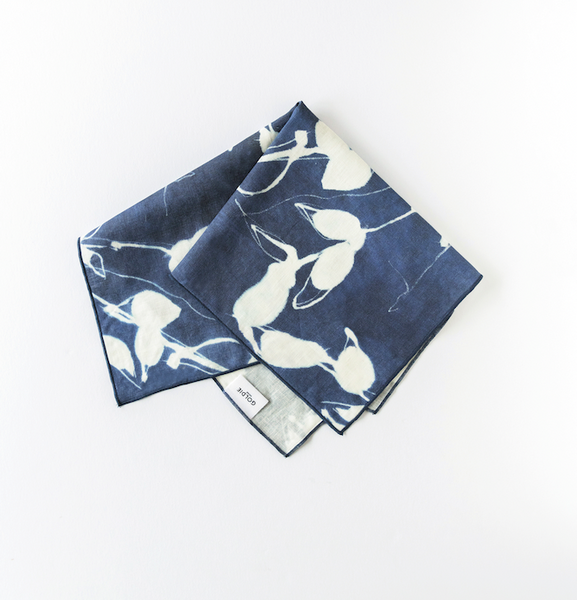 Porto Print Indigo linen dinner napkin styled on elegant place setting - Goldie Home