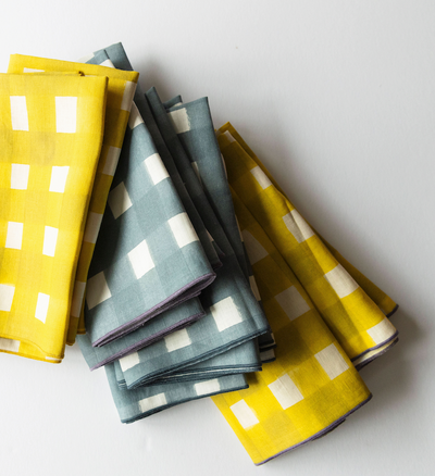 Yellow Cross-Hatch linen dinner napkin flat lay detail of brushstroke texture - Goldie Home