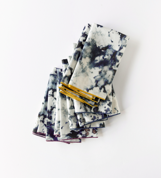 Grey Marble linen dinner napkin flat lay showing plum trim detail - Goldie Home