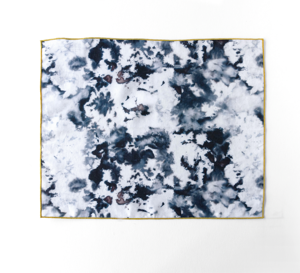 Grey Marble linen placemat with chartreuse trim variant flat lay - Goldie Home