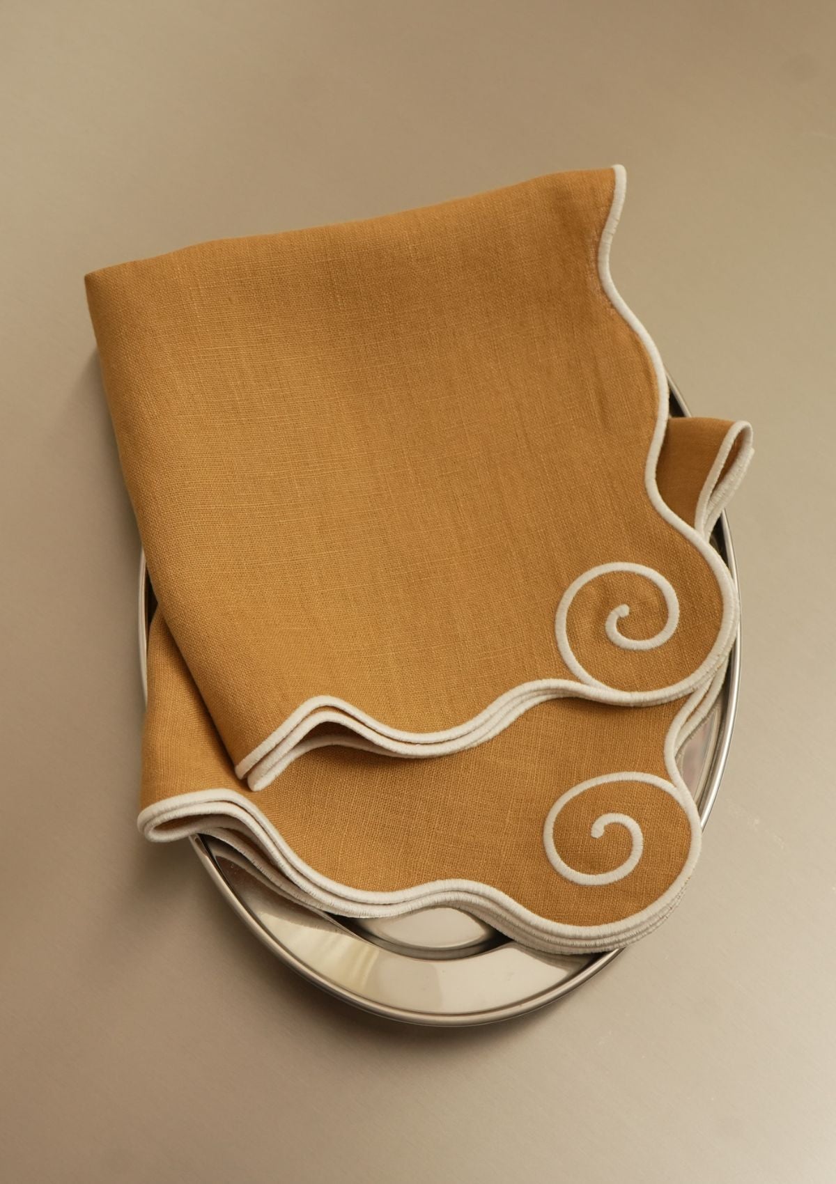 Volute Linen Napkin in Yellow ocher & White