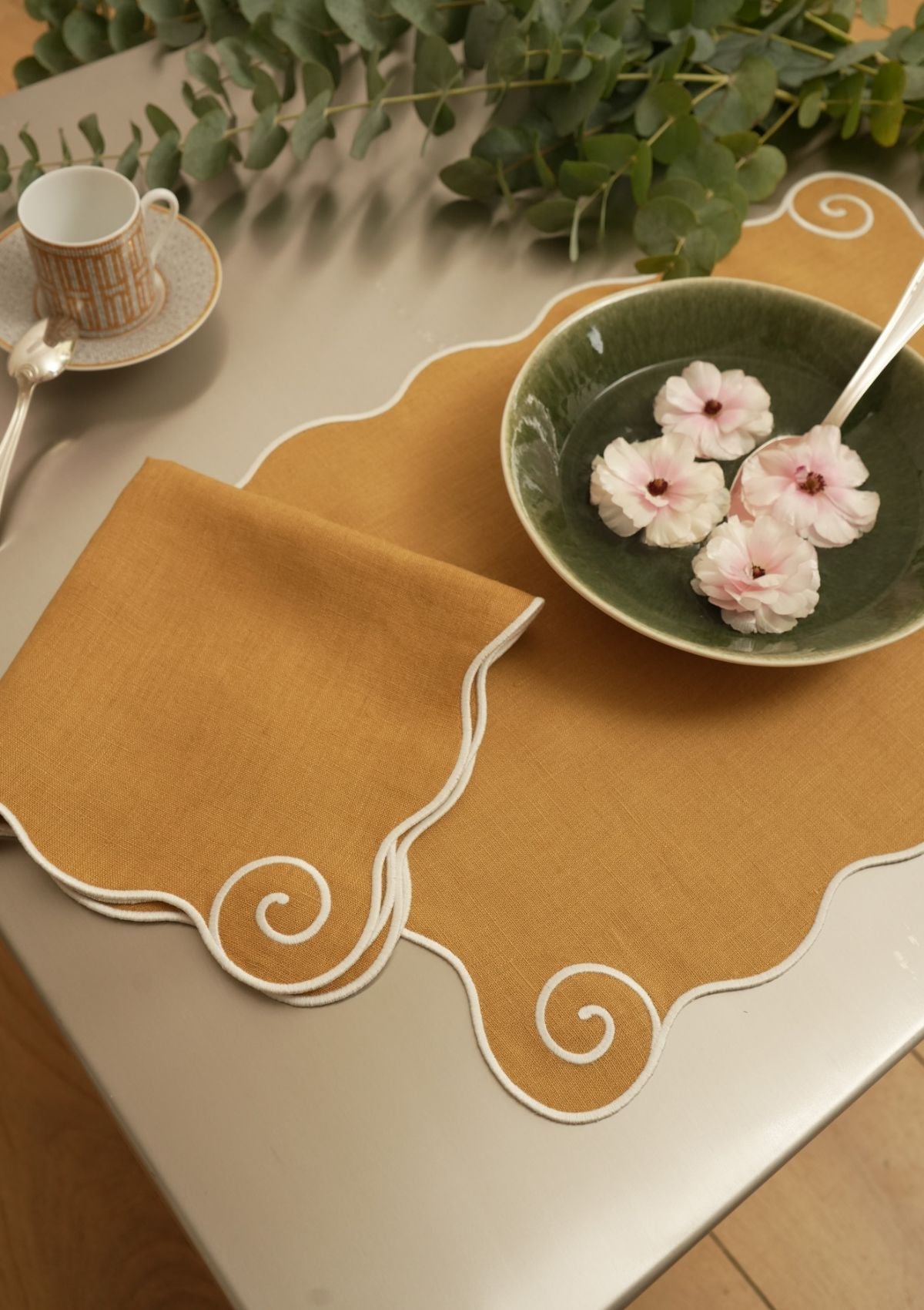 Volute Linen Napkin in Yellow ocher & White