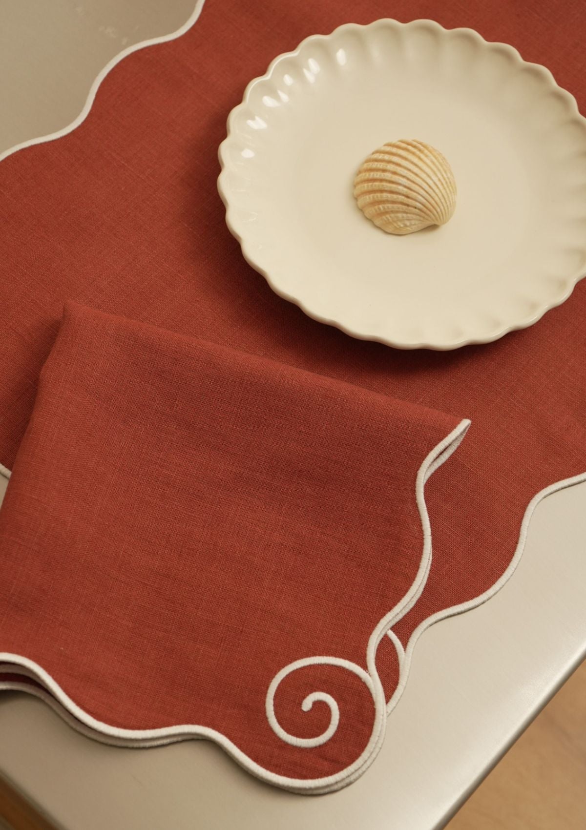 Volute Linen Napkin in Terracotta & White