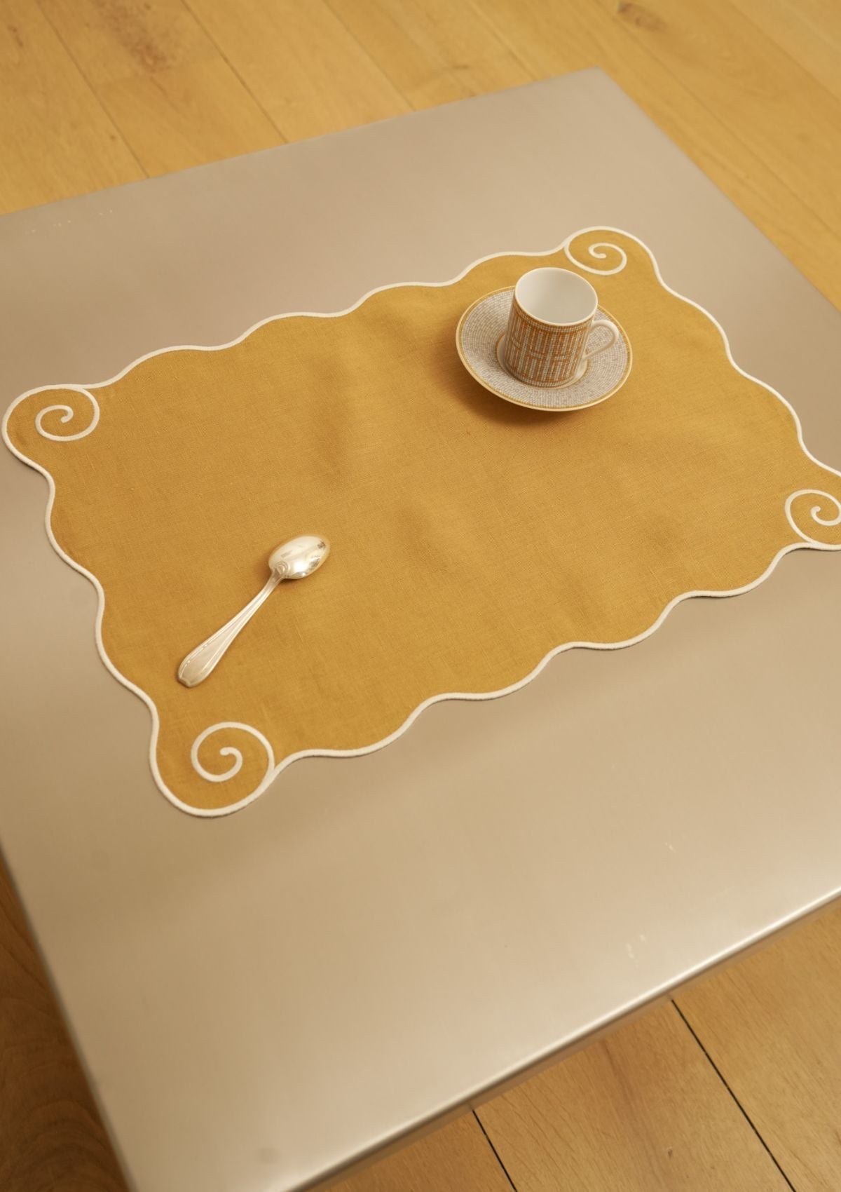 Volute Linen Placemat in Yellow Ocher & White