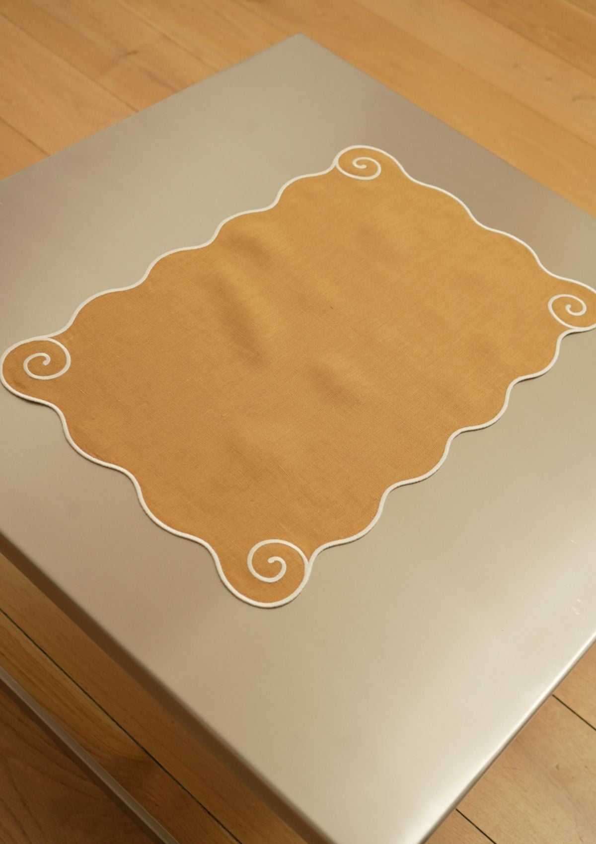 Volute Linen Placemat in Yellow Ocher & White