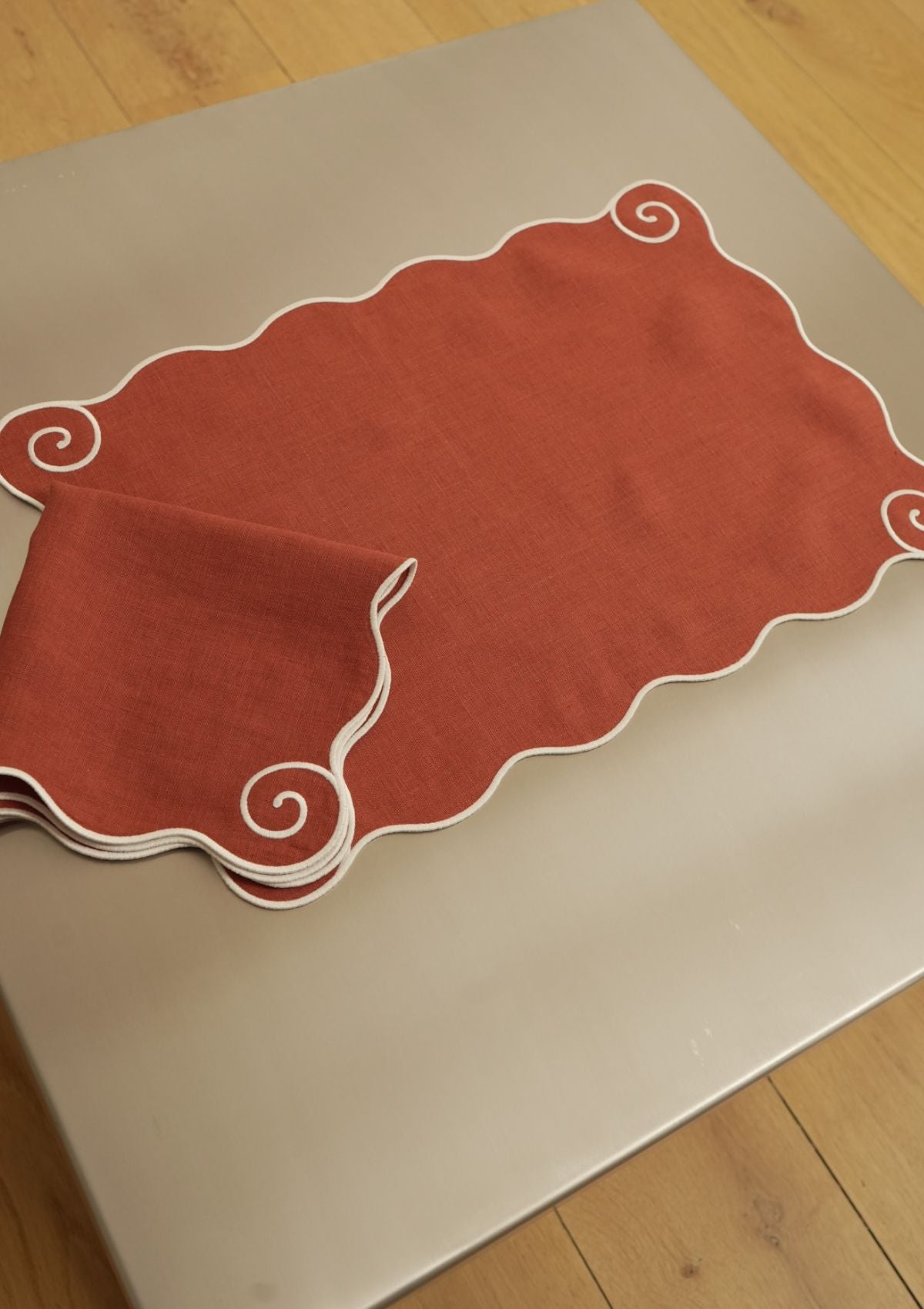 Volute Linen Placemat in Red Ocher & White