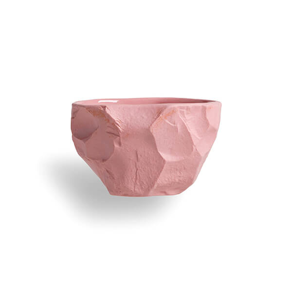 Chipped and carves, the Crockery collection is crafted with the tools of a stone mason and then hand poured with pink stained earthenware slip