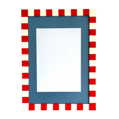 Rectangular blue frame with red and white checkered border on a white background