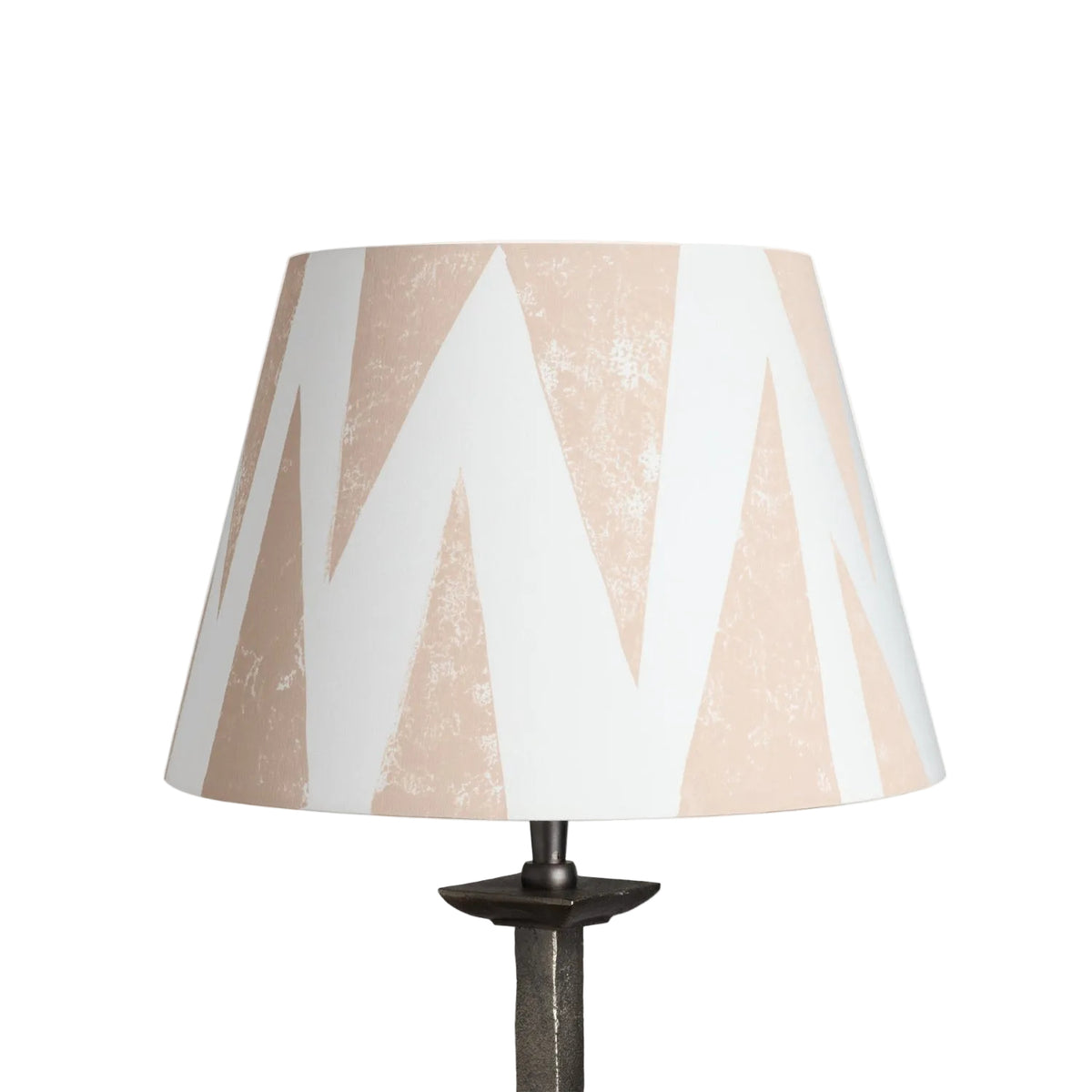 Studio product image of Tiger Tooth empire lampshade in cream with pale pink triangle pattern. A geometric lampshade with a bold yet subtle style, versatile as empire shades for table lamps or floor lamps.