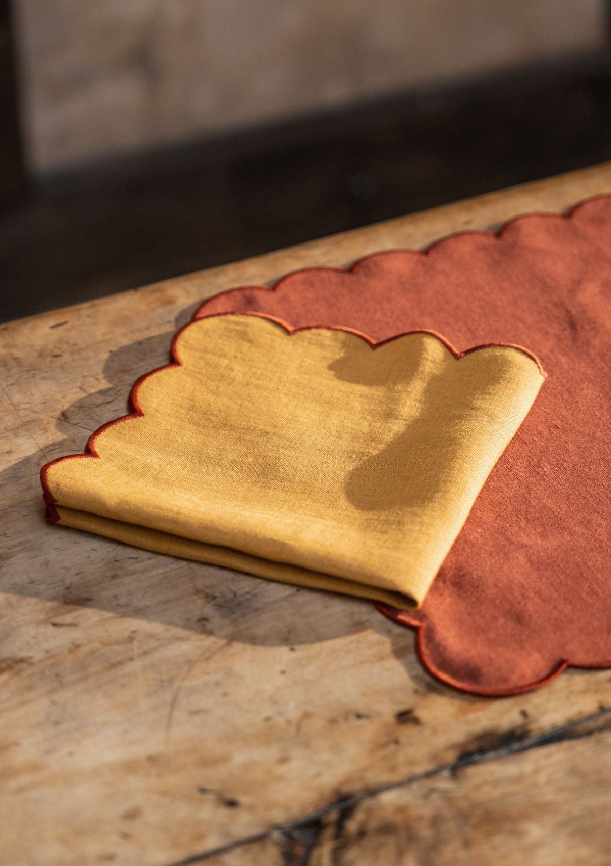 The Yellow and Red Ochre Linen Scalloped Napkins (Set of 2)