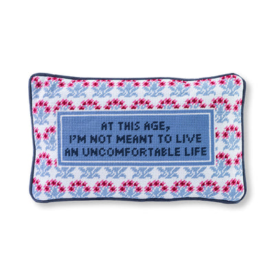 Decorative pillow with text and pattern on a white background