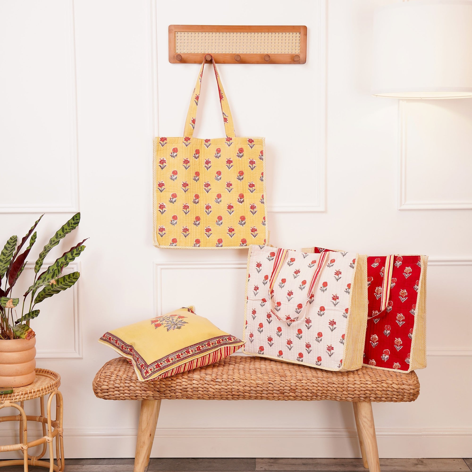 Cotton block printed tote bags in an interior with coordinating cushions