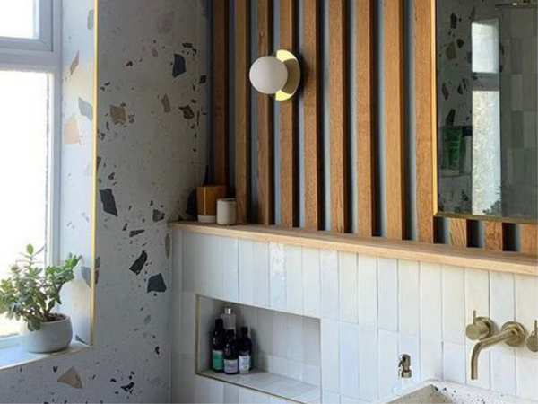 Brass opal disc wall light