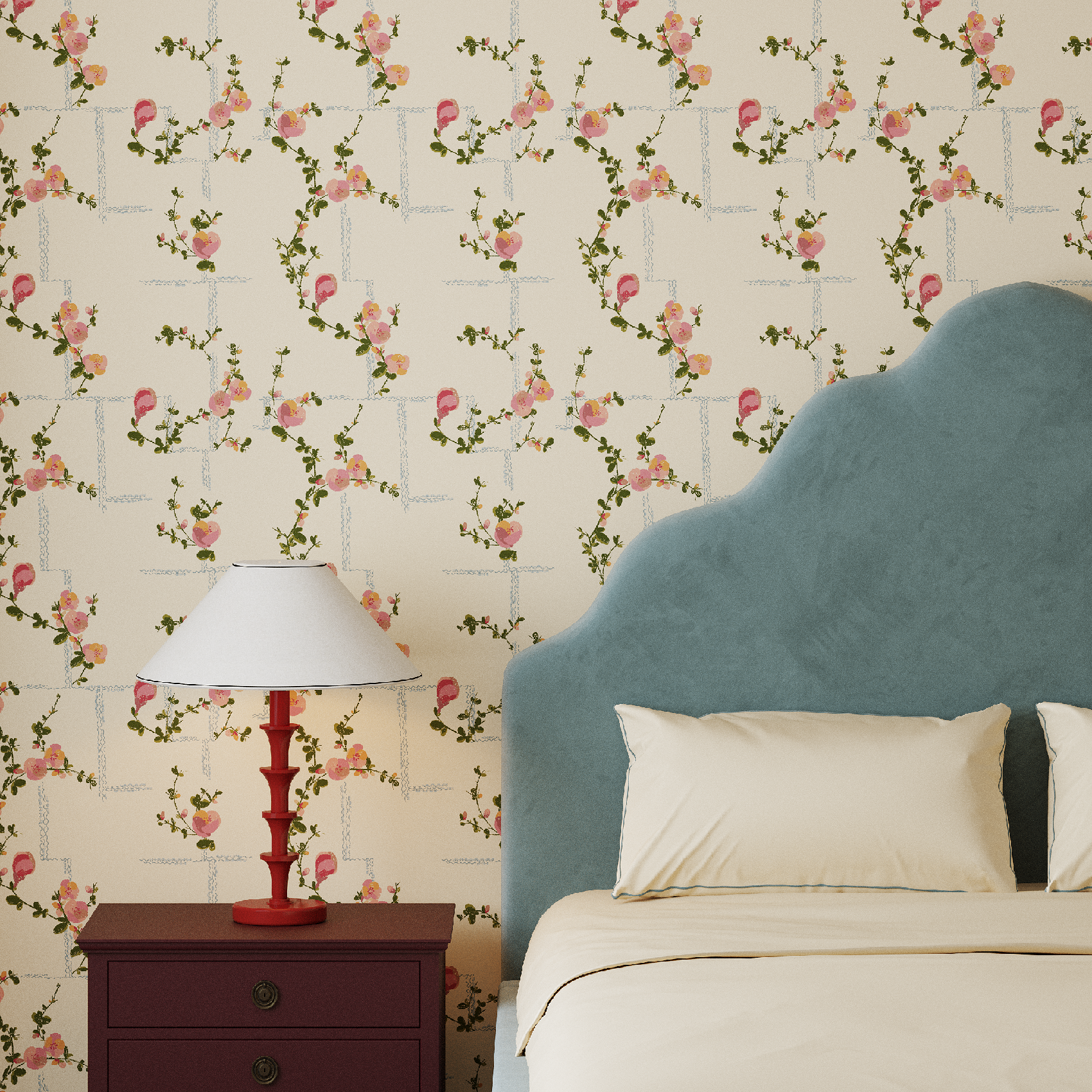 Bedroom with floral wallpaper, blue velvet upholstered headboard, and red lamp and burgundy nightstand.
