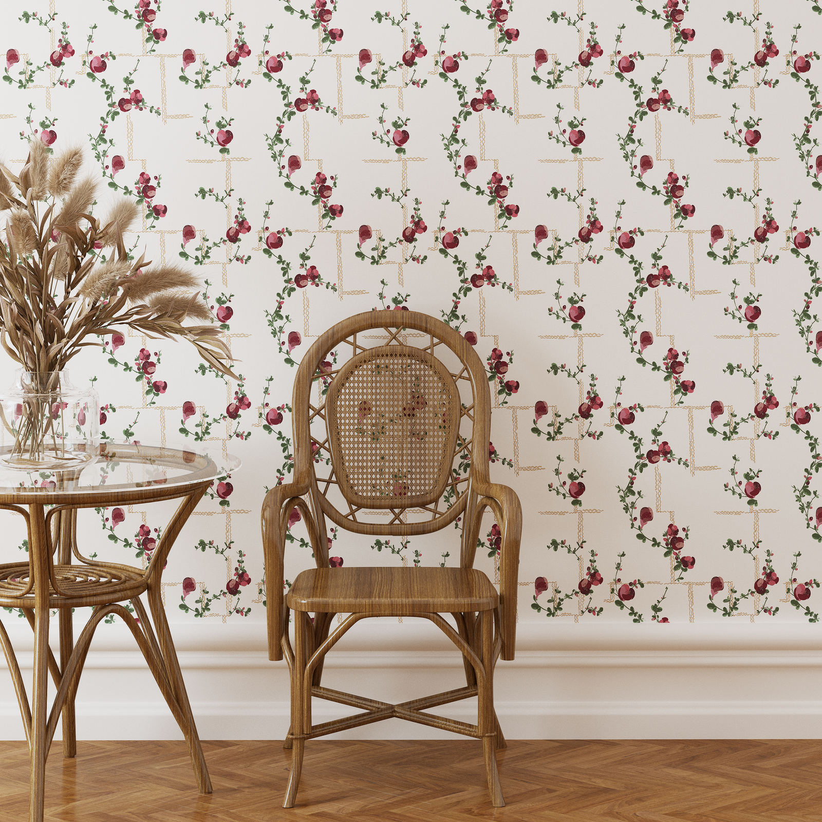 Rattan chair and table against a floral wallpapered wall