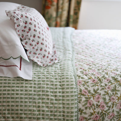 Green and pink floral quilt
