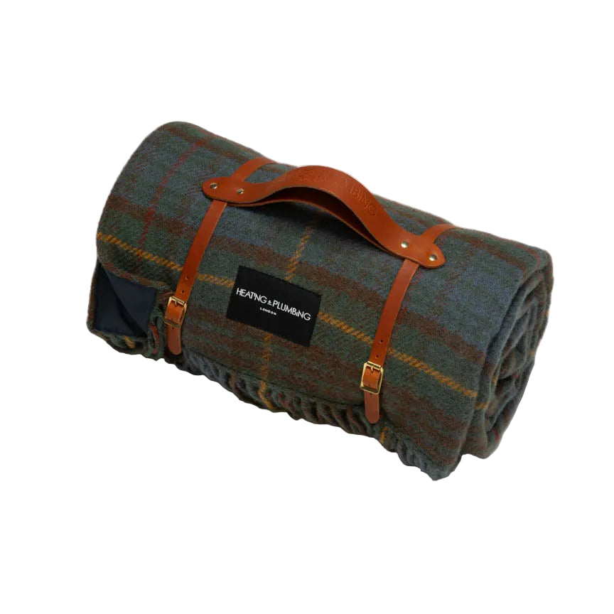 Classic khaki tartan from Scotland wool blanket with waterproof backing and tan short leather strap