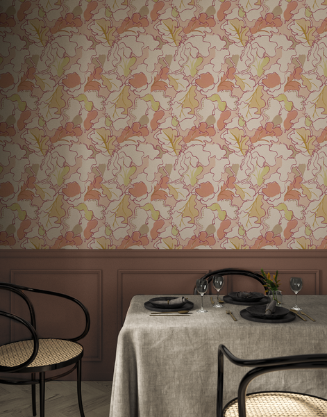 Dining room with botanical bold wallpaper, table set for dinner, and chairs.