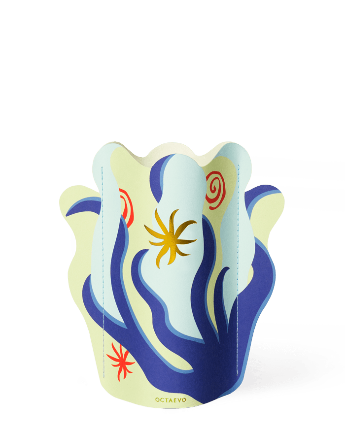 The OCTAEVO Amalfi Mini Paper Vase features abstract blue, yellow, and red shapes on a light background.