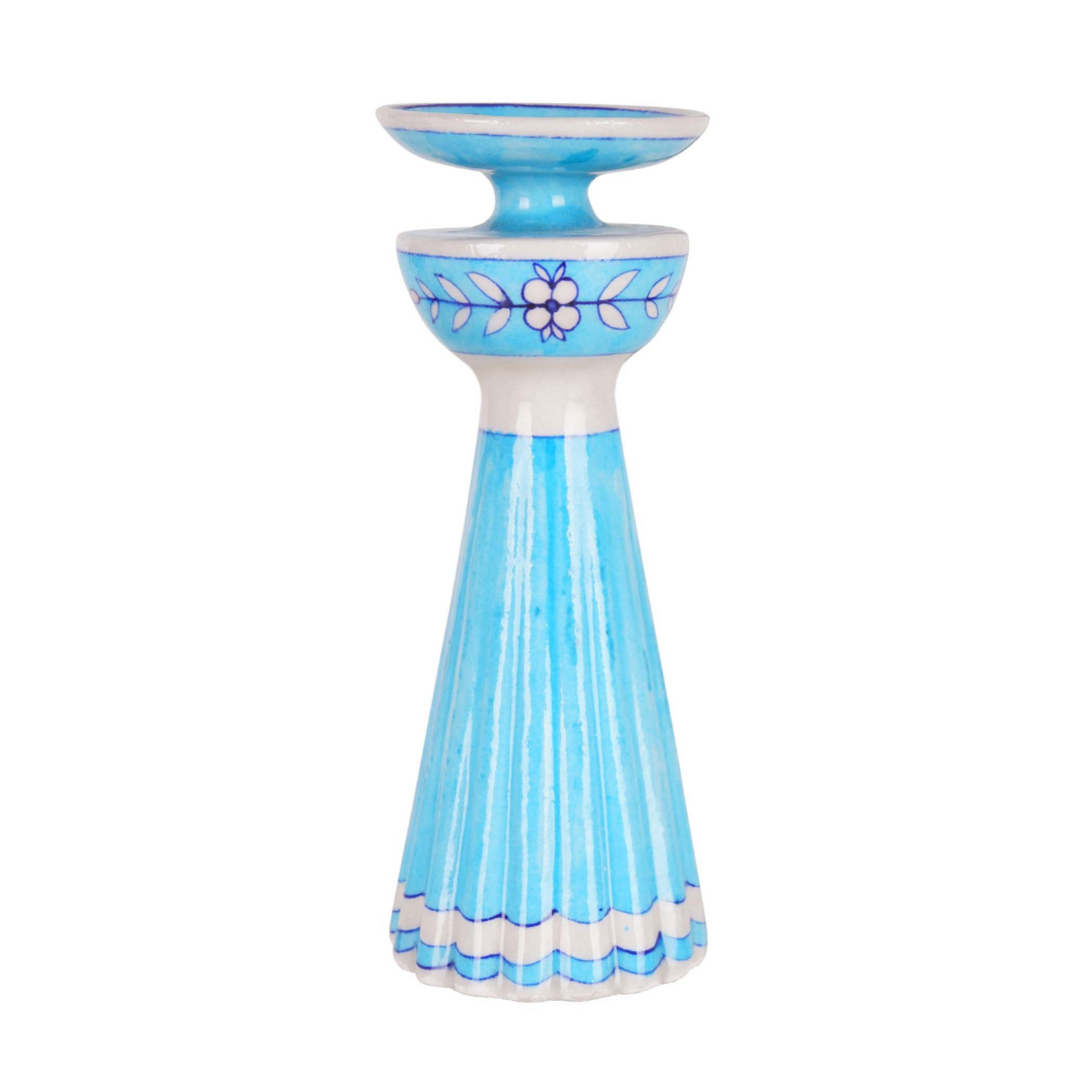 Blue candle holder with floral design on a white background