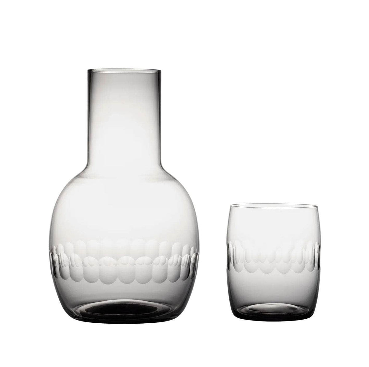 A smoky crystal carafe set with lens design