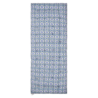 Patterned block printed mattress with blue and white geometric design on a white background
