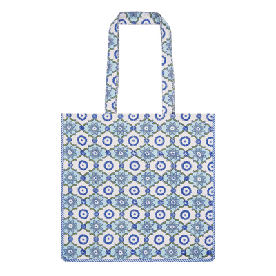 A block-printed cotton tote bag with a geometric pattern and contrast trim in blues and greens
