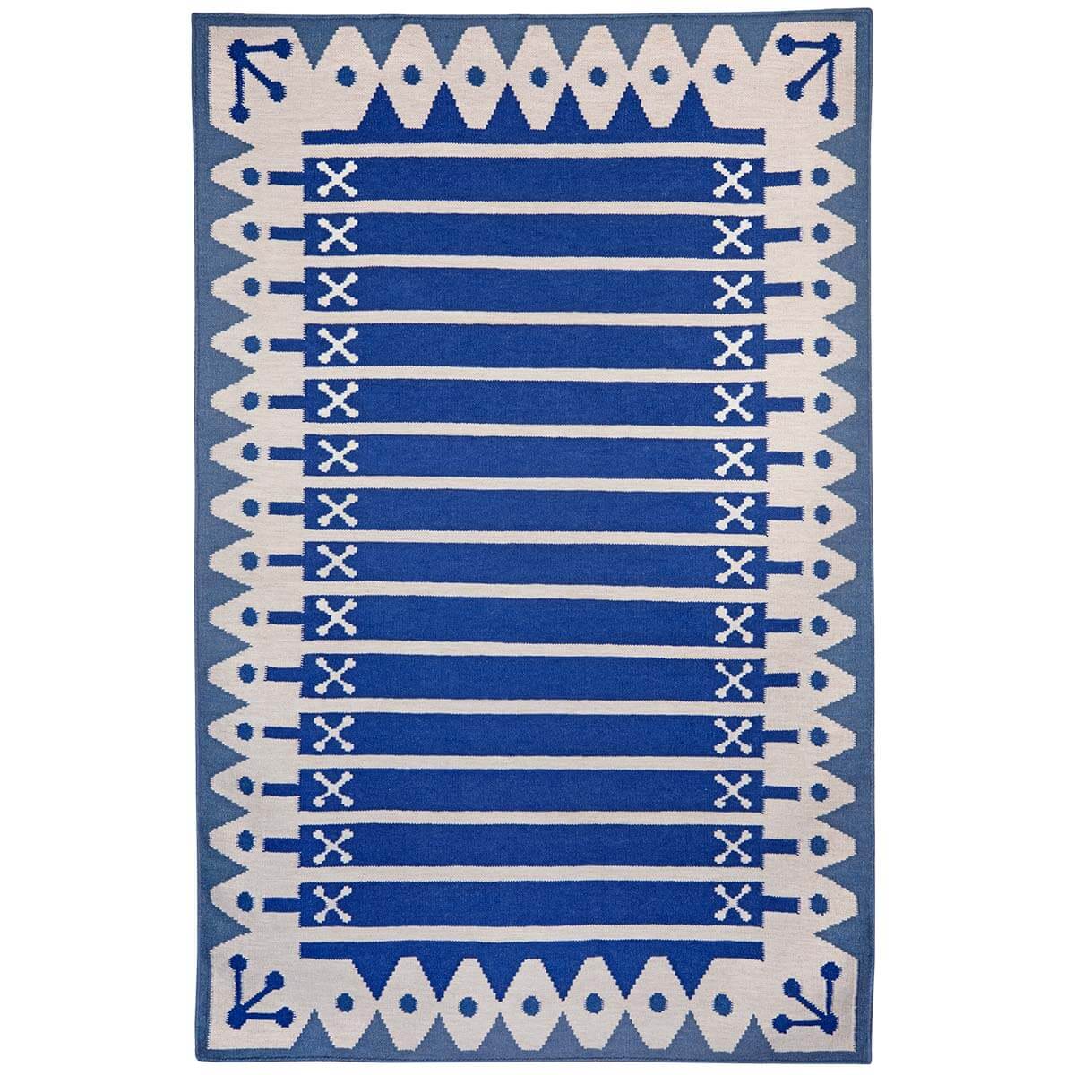 Blue Stripe Rug handwoven in wool with wide stripes and triangle border inspired by Darjeeling's architecture.