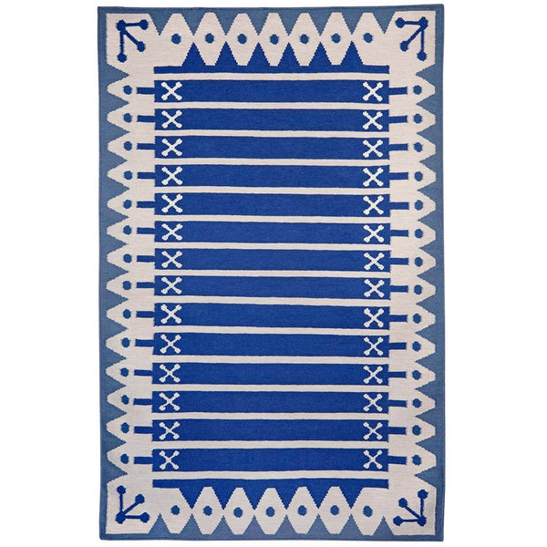 Blue Stripe Rug handwoven in wool with wide stripes and triangle border inspired by Darjeeling's architecture.