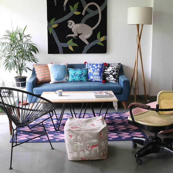 Living Room with Blue and Pink Crane rug