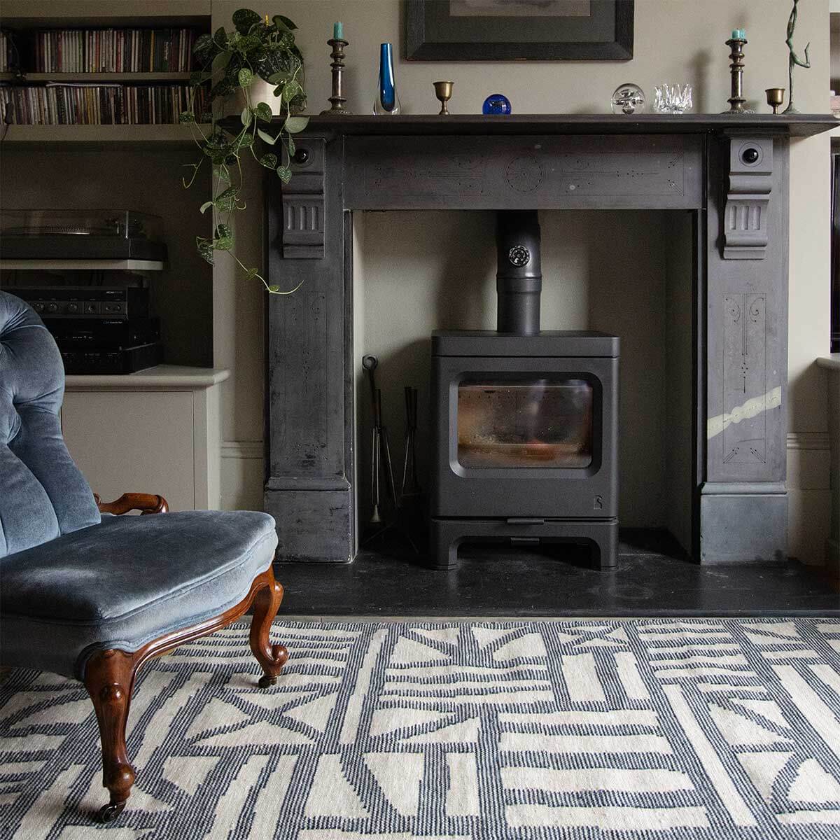 Living room with Blue Tudor flatweave rug 