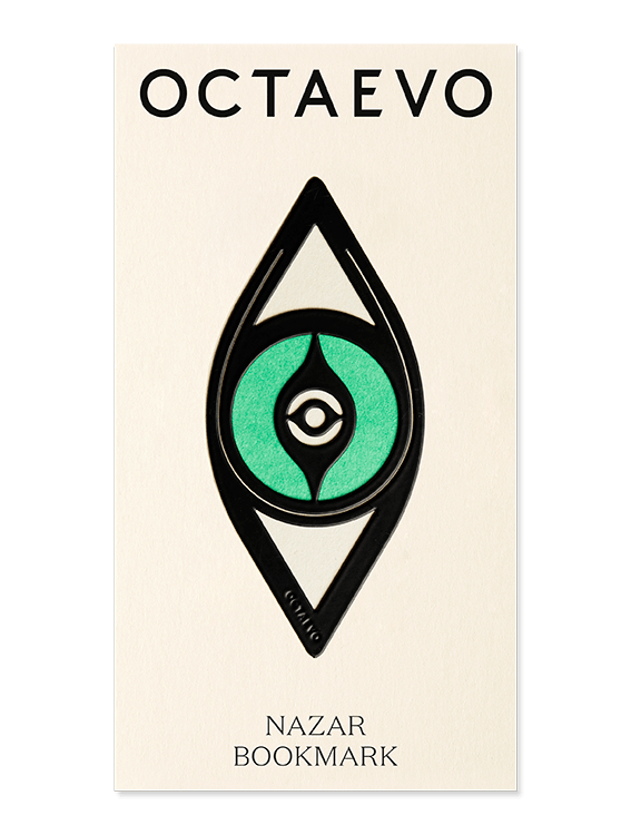 A black geometric eye-shaped bookmark by OCTAEVO, called Bookmark Nazar, on a cream card.
