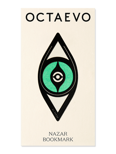 A black geometric eye-shaped bookmark by OCTAEVO, called Bookmark Nazar, on a cream card.