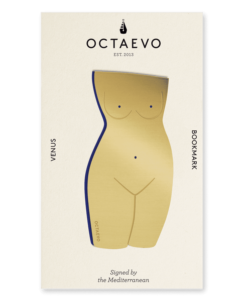 A finely-cut gold brass Bookmark Venus by OCTAEVO in the shape of female body on cardboard. 