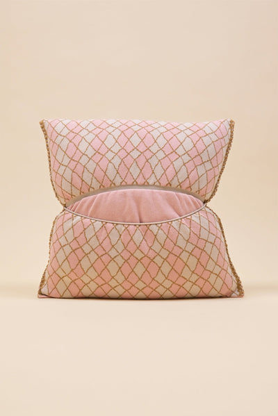 back side of pink bow-shaped knit pillowcase with romb pattern in viscose