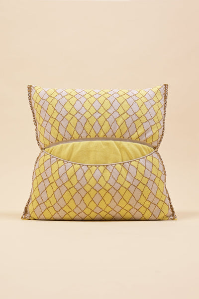 back side of yellow bow-shaped knit pillowcase with romb pattern in viscose