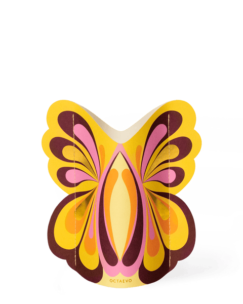Butterfly Mini Paper Vase by Octaevo, butterfly-shaped with vibrant flowers, comes in branded packaging.