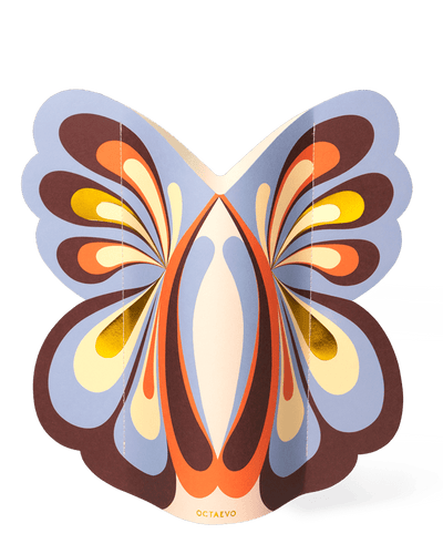 The Butterfly Paper Vase by OCTAEVO adds a burst of color and abstract style to your vibrant décor.