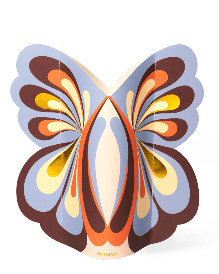 The Butterfly Paper Vase by OCTAEVO adds a burst of color and abstract style to your vibrant décor.