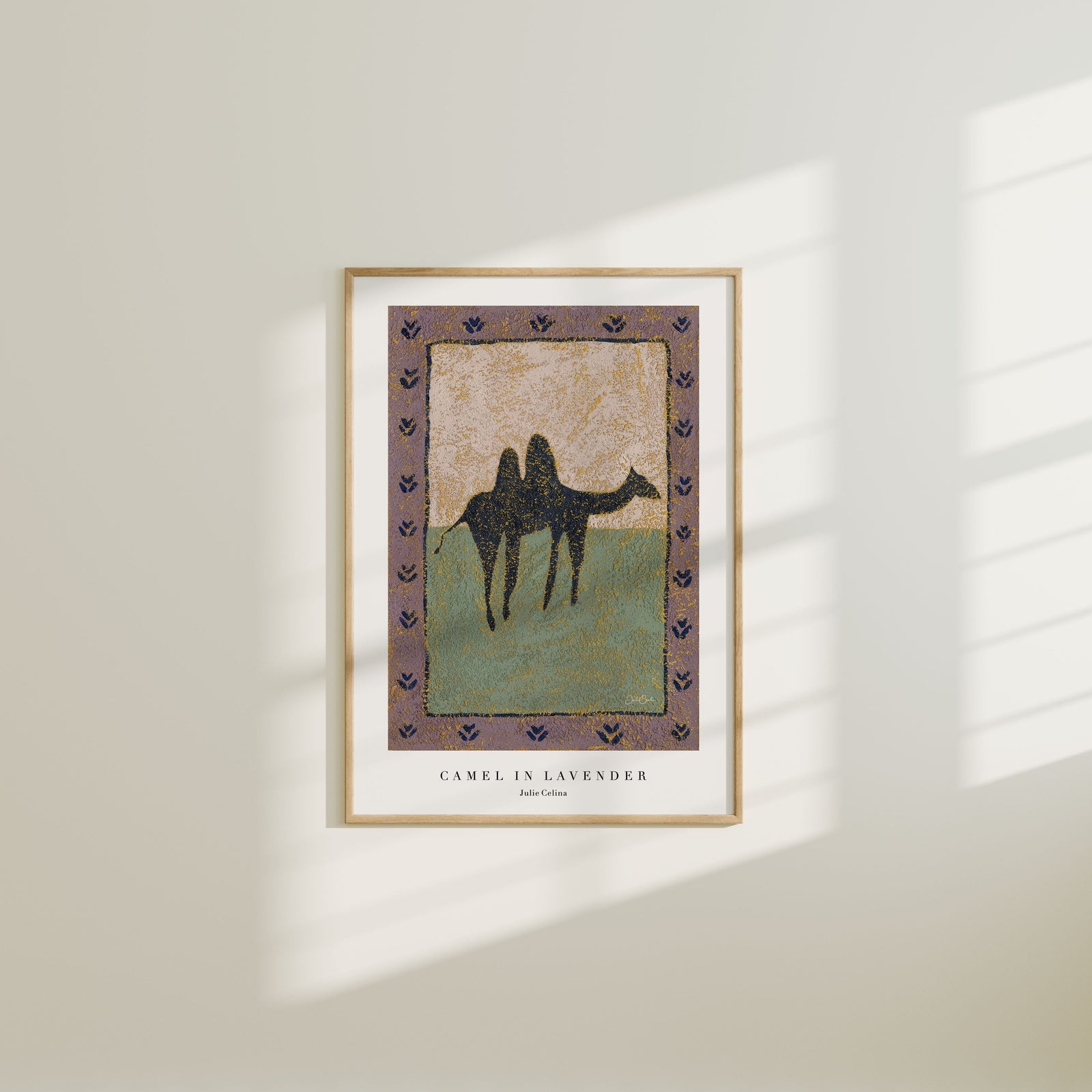 fine art print in a textured look of a silhouette of a camel framed by a lavender border with little artful marks 
