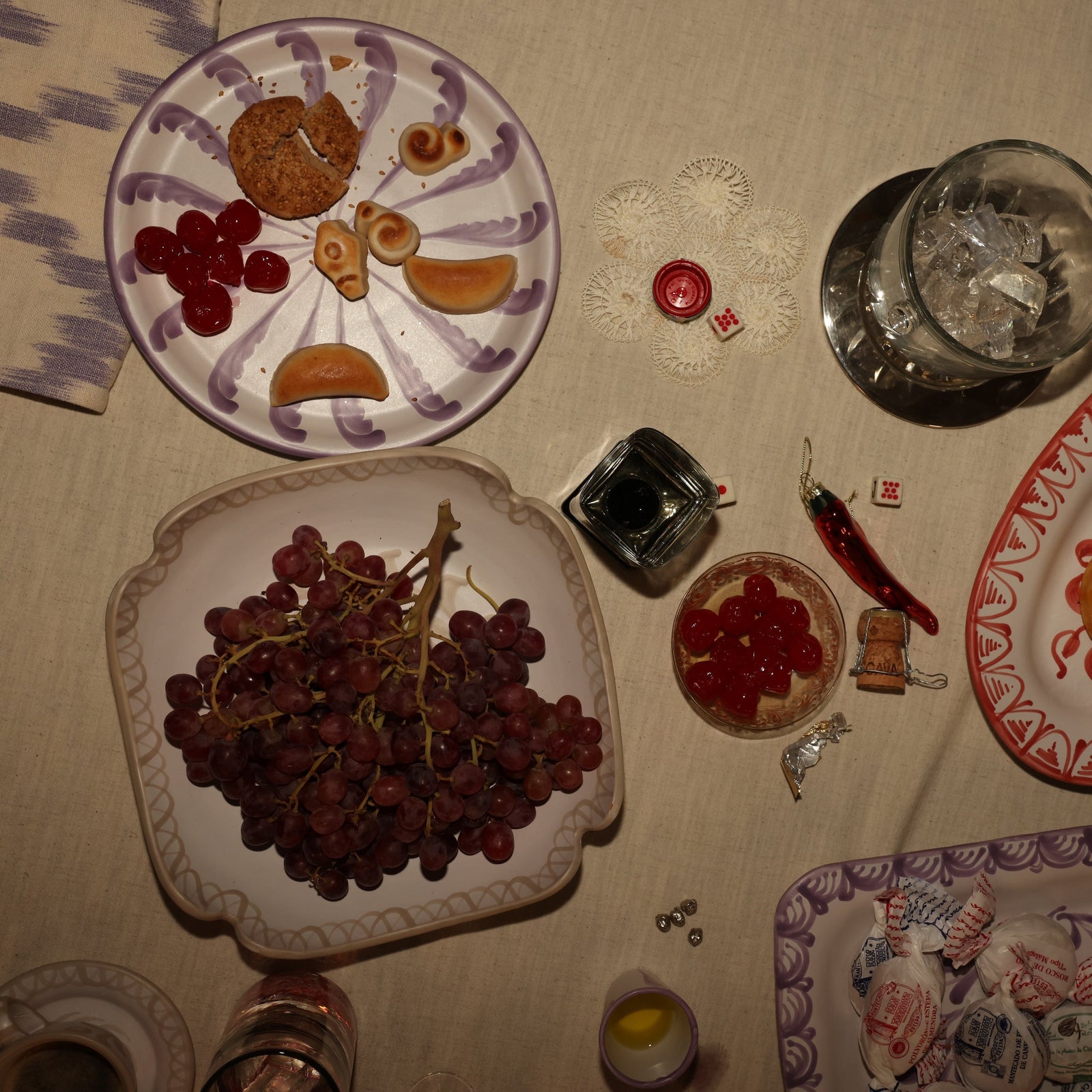 Decorative plates with fruit and a pitcher on a tablecloth  - lifestyle