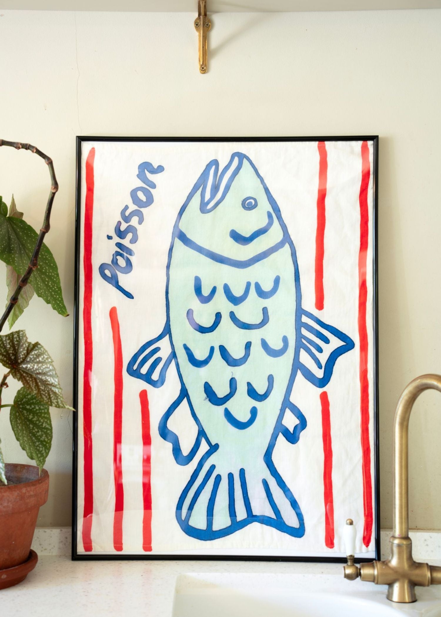 Poisson fish tea towel by Amuse La Bouche on kitchen sink