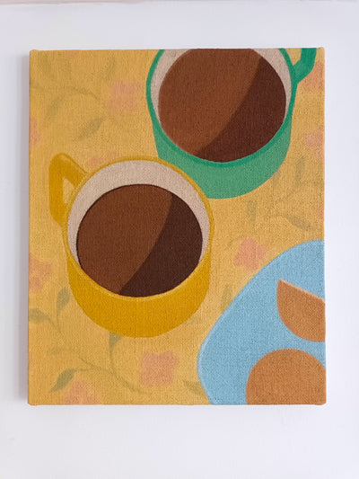 Oil painting of two cups of coffee on a yellow table cloth