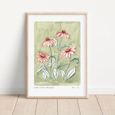 Our coneflower art print with a sage green painted background and peachy pink flowers and green outlined leaves. With small text reading floral studies: coneflower NO.7